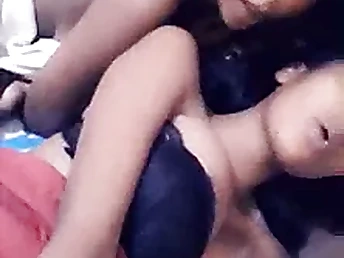 See this hot and super-naughty g/g play with her feet and get finger-tickled